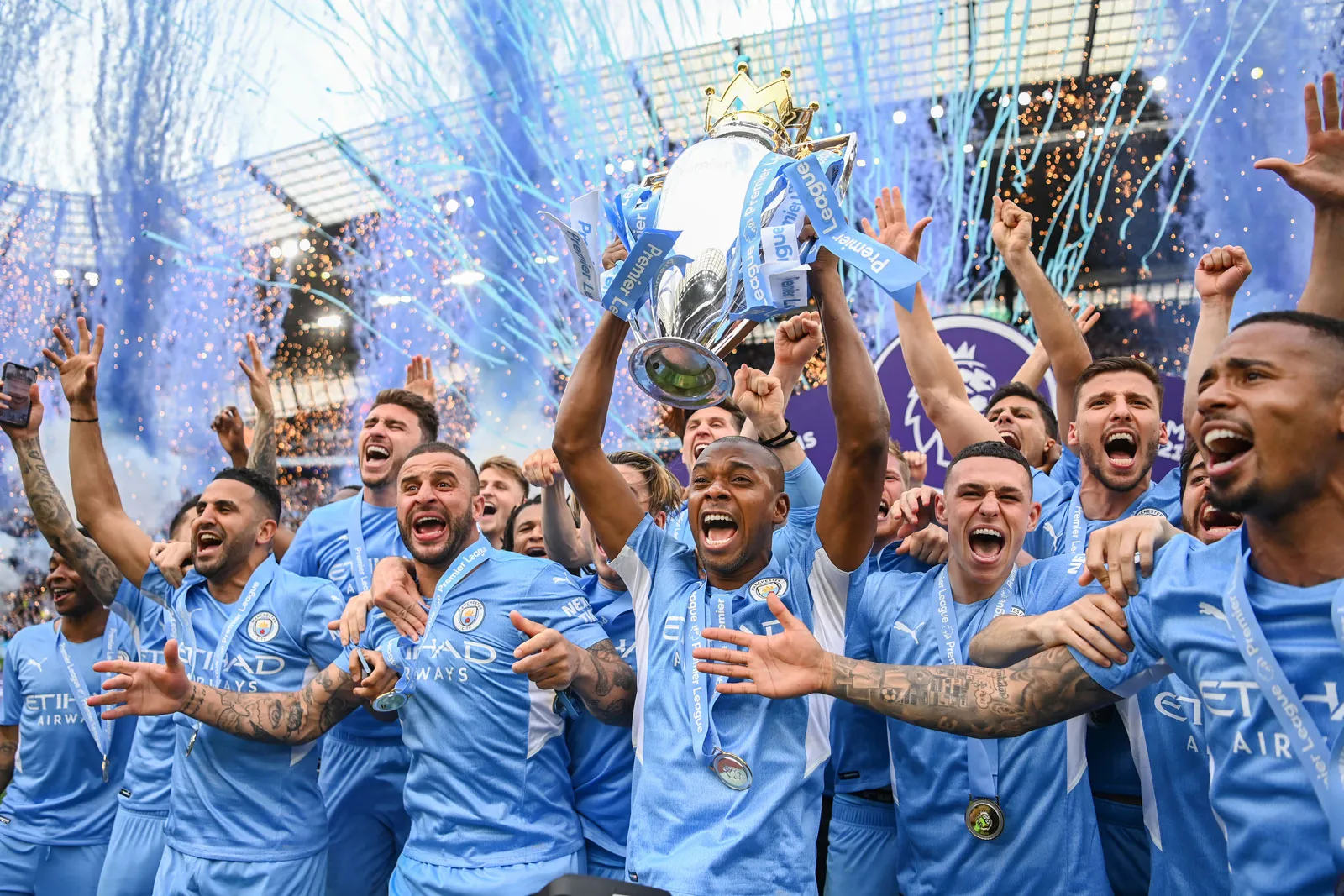 Manchester-City-Football-Club-team-celebrates-with-Premier-League-trophy-championship